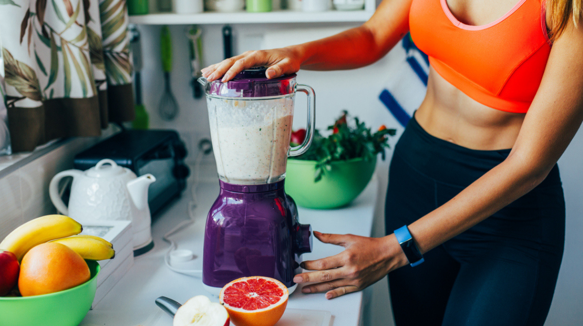 Athlete making a collagen smoothie